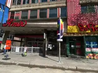 Exterior facade of this massage and body piercing studio in Ville-Marie in the city center just at the entrance to the village of Berri-Uqam.